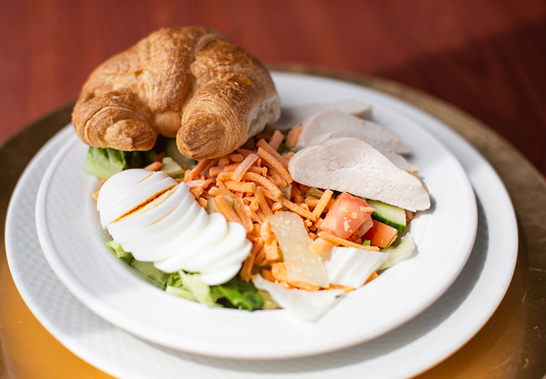 the wellington home gallery cob salad with croissant