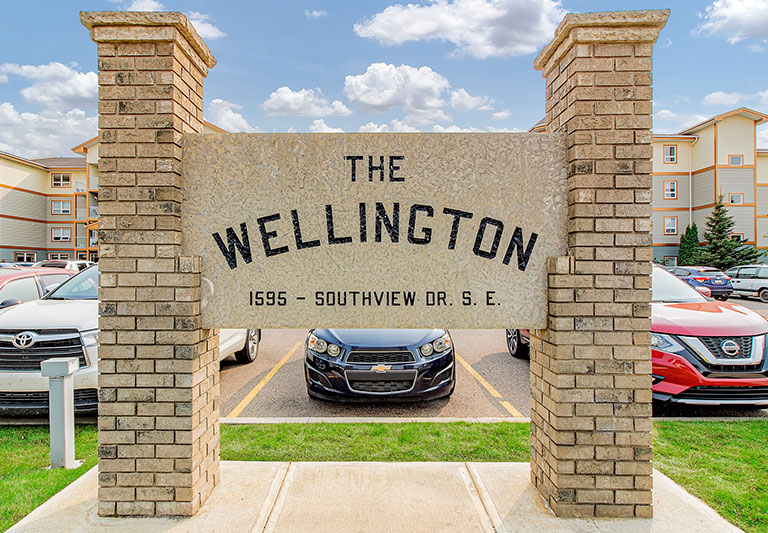 the wellington home gallery entrance sign