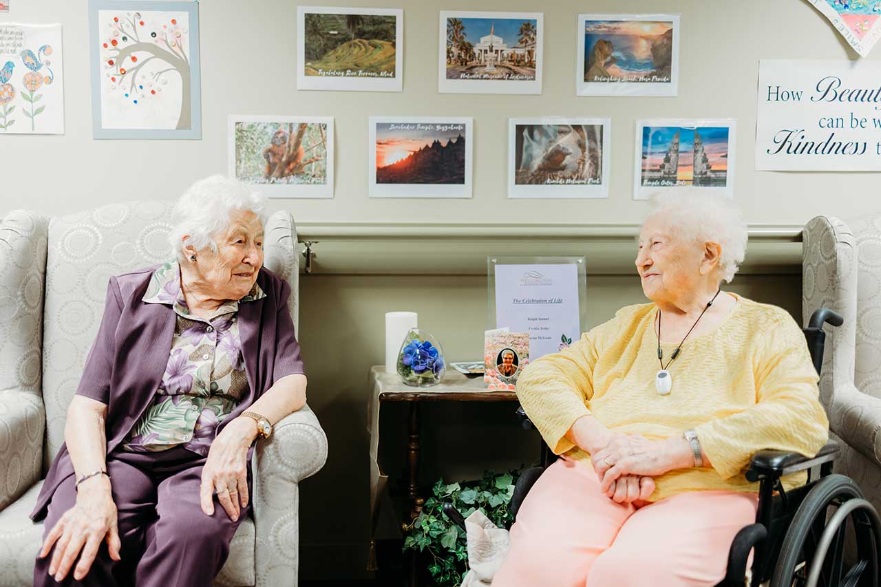 the wellington retirement residence happy seniors being social