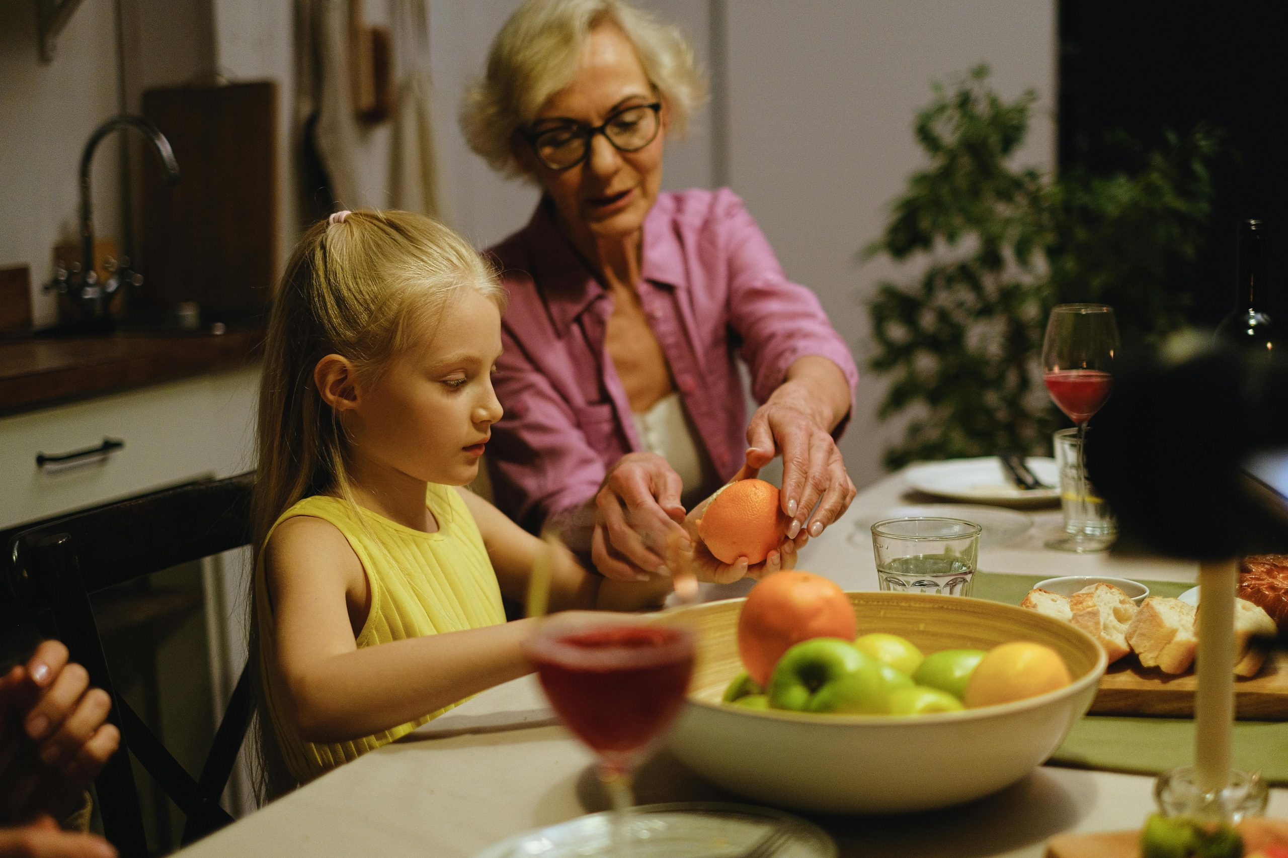 grandma and granddaughter cooking